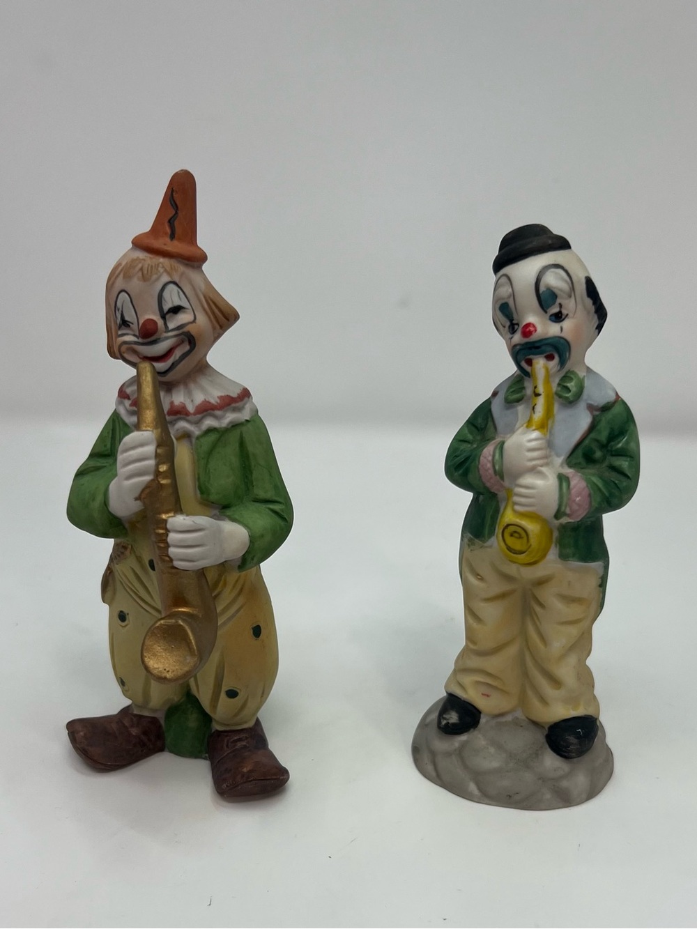 Vintage porcelain hobo clowns figurines playing musical instruments saxophone